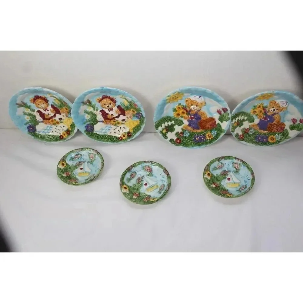 Vintage hand crafted ceramic plate set